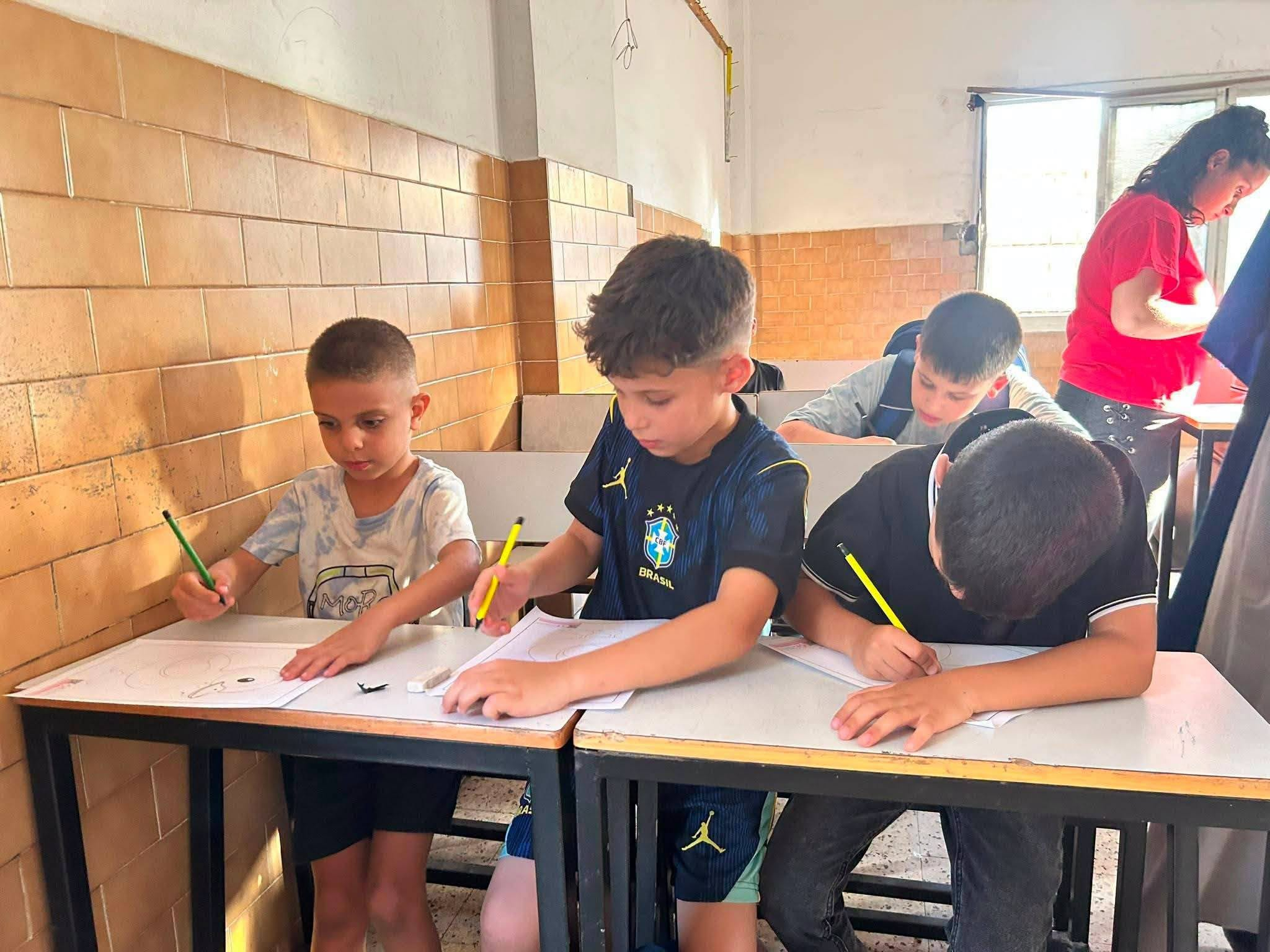 I bambini della scuola della parrocchia di Gaza