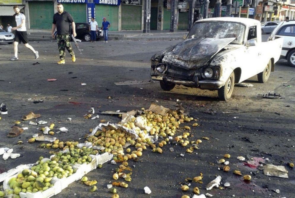 Uno degli attacchi kamikaze a Sweida (Ansa)