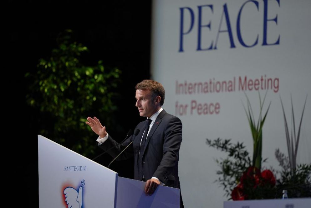 Il presidente Macron all'incontro internazionale per la pace organizzato da Sant'Egidio a Parigi - Ansa