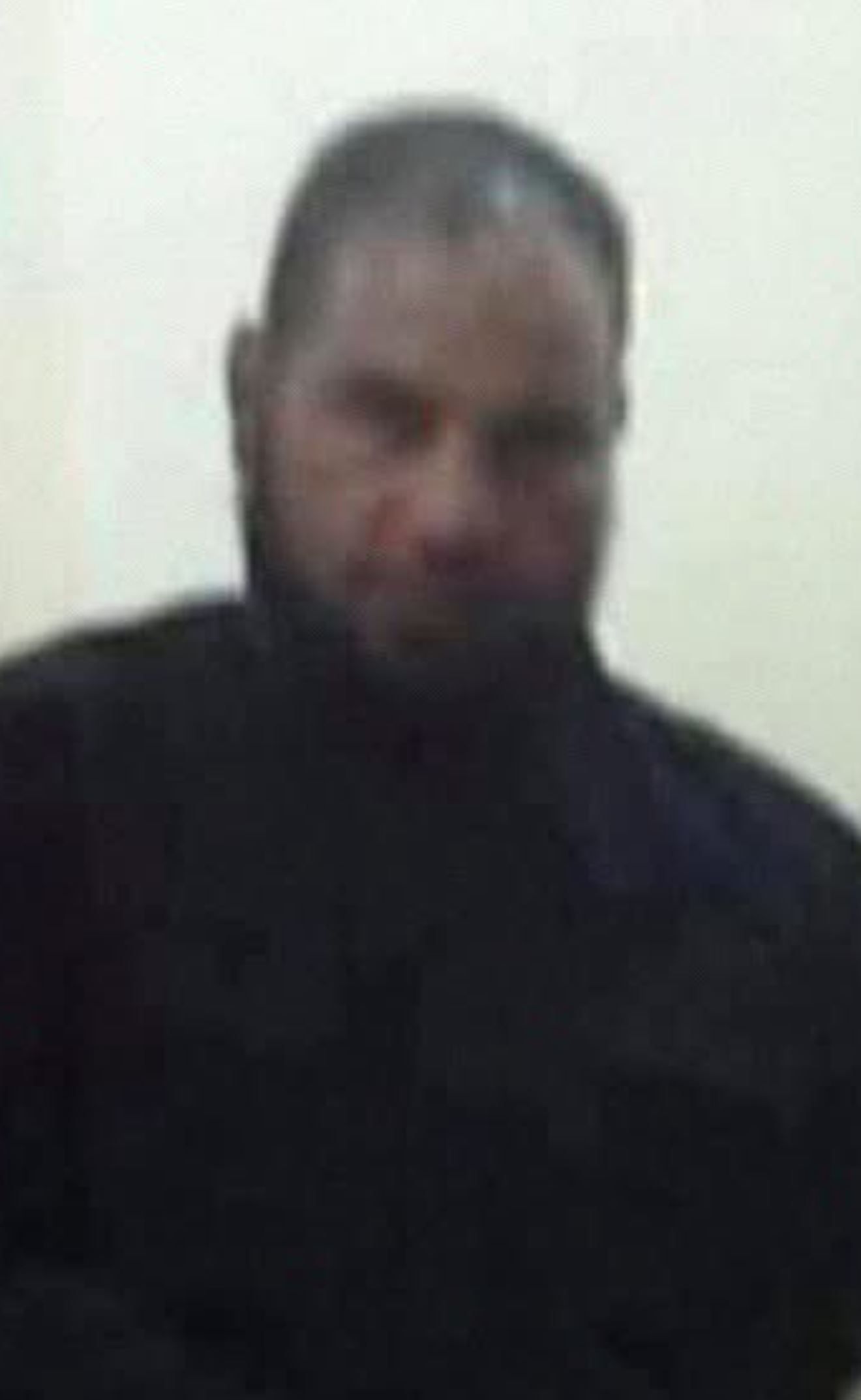 Al Buti, in una delle poco foto in cui appare