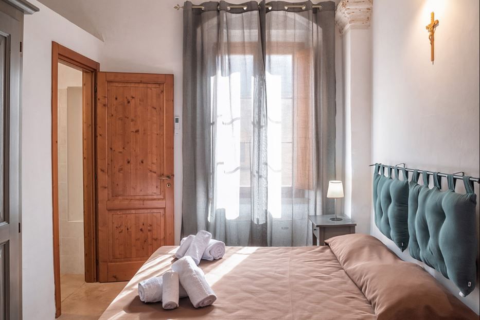 Una delle camere della casa della convivialità don Tonino Bello di Alessano (Lecce) - Associazione “Ospitalità religiosa italiana”