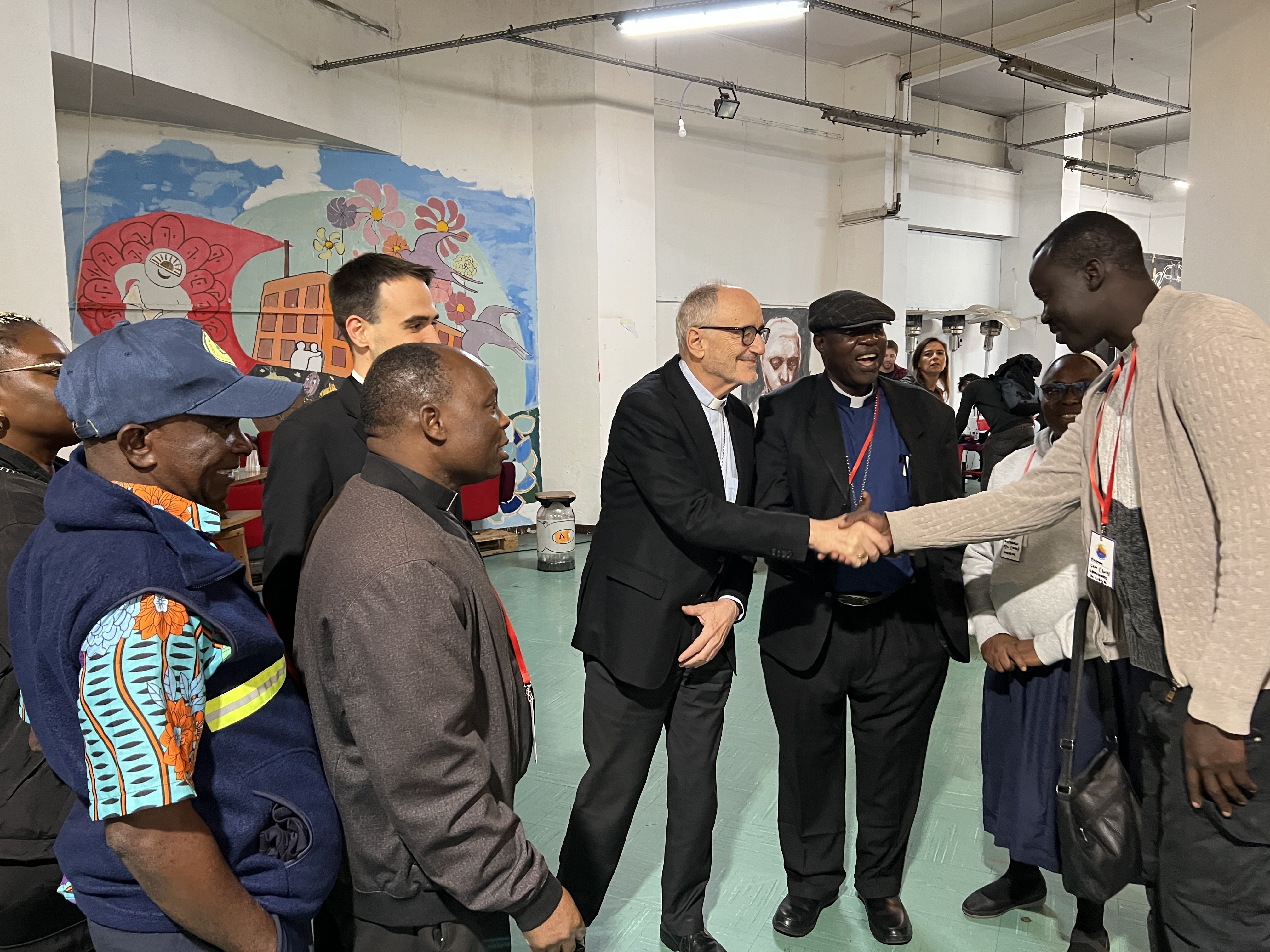 Il cardinale Michael Czerny a ”Spin Time”,  il palazzo di Roma  che dal 2013 è occupato e che in questi giorni ospita l’Incontro mondiale dei movimenti popolari / GAMBASSI
