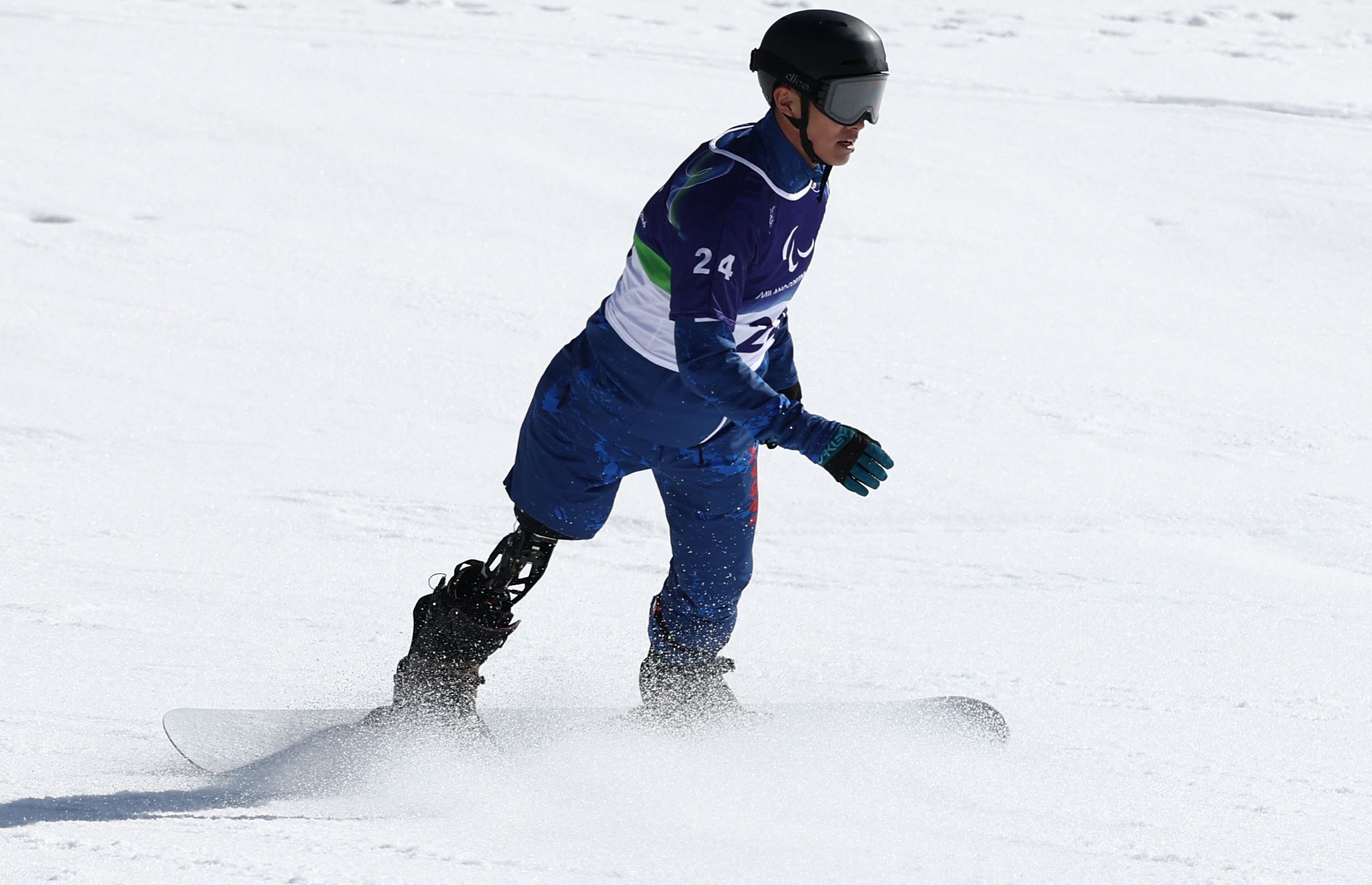 Il giapponese&nbsp;Junta Kosuda nel Cortina Para Snowboard Park, / Reuters / Stoyan Nenov