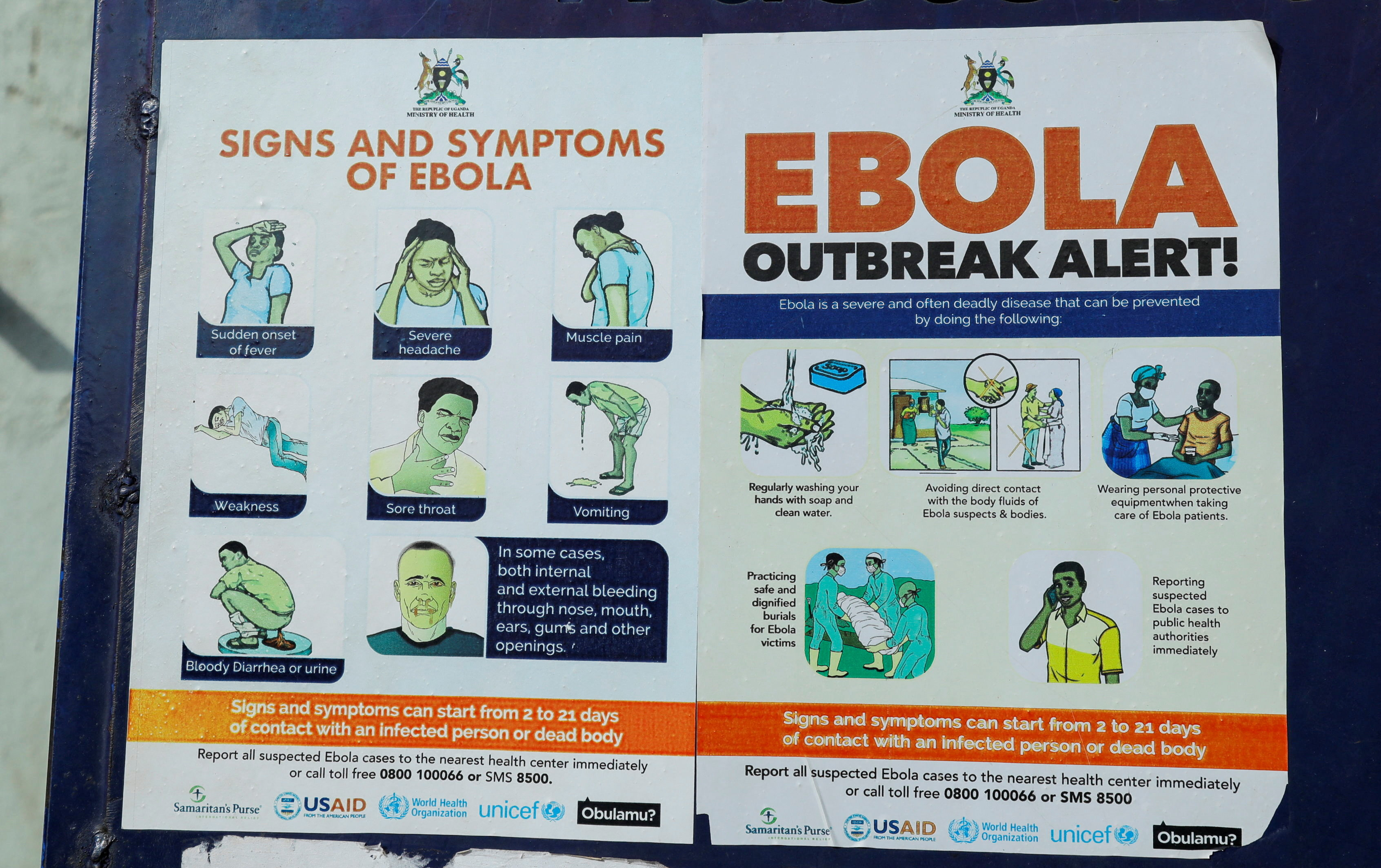 I cartelli che avvisano la popolazione ugandese sui sintomi di Ebola